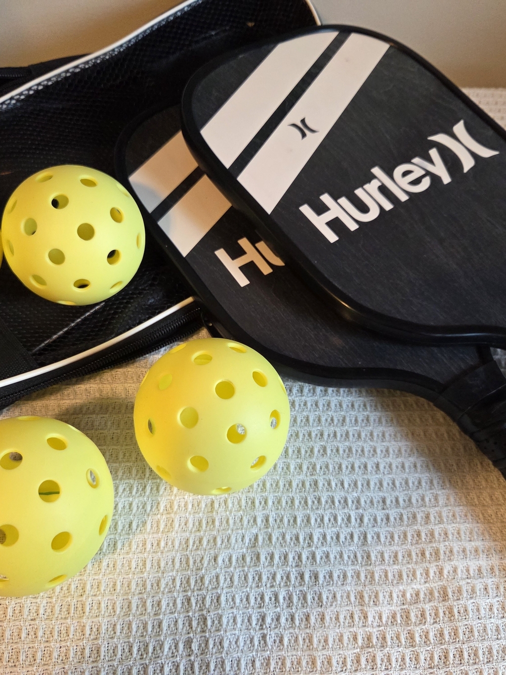 Hurley Black & White Pickleball Paddle Set with Yellow Practice Balls